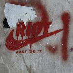 "Riot: just do it" graffiti. Photo via the euskadi 11.